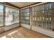 Bright sunroom with multiple windows and vertical blinds at 41 Villa Villar Ct # 41, Deland, FL 32724