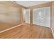 Bright bedroom with wood floors and double door closet at 41 Villa Villar Ct # 41, Deland, FL 32724