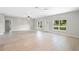 Spacious living area with light walls and wood-look flooring at 1650 Caroline Dr, Pierson, FL 32180