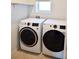 Functional laundry room with side-by-side washer and dryer at 226 Meghan Cir, Deland, FL 32724