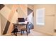Home office with geometric accent wall and modern desk at 226 Meghan Cir, Deland, FL 32724