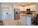 Modern kitchen with stainless steel appliances and granite countertops at 226 Meghan Cir, Deland, FL 32724