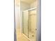 Bathroom with sliding shower door and tiled floor at 226 Meghan Cir, Deland, FL 32724