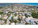 Aerial view of a house near the ocean and river, highlighting its coastal location at 134 Avalon Dr # A, Ormond Beach, FL 32176