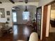 Living room with hardwood floors and access to other rooms at 2202 Lake Ruby Rd, Deland, FL 32724