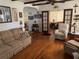 Spacious living room with hardwood floors and view to bedroom at 2202 Lake Ruby Rd, Deland, FL 32724