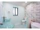 Updated bathroom with double vanity and stylish tile work at 121 Willow Bend Ln, Ormond Beach, FL 32174