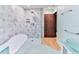 Bathroom with walk in shower, freestanding tub, and modern tile at 121 Willow Bend Ln, Ormond Beach, FL 32174