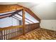Spacious loft with wood beams, and neutral carpeting at 121 Willow Bend Ln, Ormond Beach, FL 32174