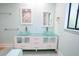 Modern bathroom with double vanity, glass sinks, and updated fixtures at 121 Willow Bend Ln, Ormond Beach, FL 32174