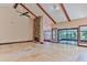 Spacious living room with high ceilings, stone fireplace, and tile floors at 121 Willow Bend Ln, Ormond Beach, FL 32174