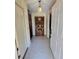 Entryway with tiled floor and built-in shelving at 833 E 22Nd Ave, New Smyrna Beach, FL 32169