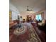 Open living room with hardwood floors and a dining area at 833 E 22Nd Ave, New Smyrna Beach, FL 32169