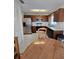 Kitchen with stainless steel appliances and wood cabinets at 833 E 22Nd Ave, New Smyrna Beach, FL 32169