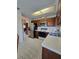 Kitchen features stainless steel appliances and ample counter space at 833 E 22Nd Ave, New Smyrna Beach, FL 32169