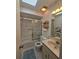 Clean bathroom with a shower/tub combo, toilet and vanity at 833 E 22Nd Ave, New Smyrna Beach, FL 32169