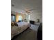 Spacious main bedroom with a queen bed and ensuite bathroom access at 833 E 22Nd Ave, New Smyrna Beach, FL 32169