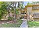 Image 1 of 38: 140 Orchid Woods Ct 9A, Deltona