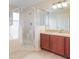Bathroom featuring a shower, bathtub, vanity, and toilet at 196 Athabasca Dr, Poinciana, FL 34759