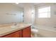 Bathroom with tub/shower combination, single vanity, and tile floor at 196 Athabasca Dr, Poinciana, FL 34759