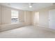 Spacious bedroom with a window seat and carpeted flooring at 196 Athabasca Dr, Poinciana, FL 34759