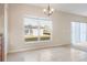 Bright breakfast nook with tile floors and a view of the backyard at 196 Athabasca Dr, Poinciana, FL 34759