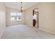 Dining room with a chandelier and a view into the kitchen at 196 Athabasca Dr, Poinciana, FL 34759
