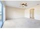 Spacious main bedroom with access to the laundry room at 196 Athabasca Dr, Poinciana, FL 34759