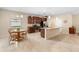 Kitchen boasts stainless steel appliances and an island with seating at 509 W Victoria Trails Blvd, Deland, FL 32724