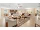 Open-concept living room with kitchen and dining area views at 509 W Victoria Trails Blvd, Deland, FL 32724
