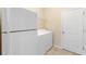 Laundry room with washer, dryer, and extra space at 509 W Victoria Trails Blvd, Deland, FL 32724