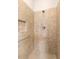 Large walk-in shower with neutral tile and grab bar at 509 W Victoria Trails Blvd, Deland, FL 32724