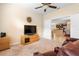Comfortable sitting area with two recliners and view into kitchen at 509 W Victoria Trails Blvd, Deland, FL 32724