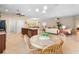 Kitchen features an island, stainless steel appliances, and granite countertops at 509 W Victoria Trails Blvd, Deland, FL 32724