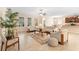Open-concept living room featuring a neutral color palette and ample natural light at 509 W Victoria Trails Blvd, Deland, FL 32724