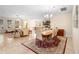 Bright dining area with seating for six and view into living room at 509 W Victoria Trails Blvd, Deland, FL 32724