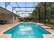 Inviting screened pool area with brick pavers at 509 W Victoria Trails Blvd, Deland, FL 32724