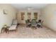 Covered patio with seating area, perfect for dining at 509 W Victoria Trails Blvd, Deland, FL 32724