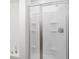 Clean shower with glass enclosure and built-in shelves at 968 Springs Landing Dr, Deltona, FL 32725