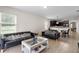 Open concept living room with adjoining kitchen and dining areas at 968 Springs Landing Dr, Deltona, FL 32725