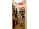 Large walk-in closet with shelving and hanging rods at 24008 Ermine Rd, Astor, FL 32102