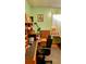 Home office with a desk, chair, and built-in shelving at 24008 Ermine Rd, Astor, FL 32102