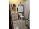Simple bathroom with a vanity, toilet and shower at 24008 Ermine Rd, Astor, FL 32102