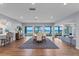 Spacious dining area with ocean views and hardwood floors at 717 Ocean Shore Blvd, Ormond Beach, FL 32176