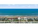 Aerial of beachfront home, showcasing location and surroundings at 717 Ocean Shore Blvd, Ormond Beach, FL 32176