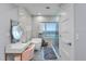 Ocean-view bathroom with soaking tub and walk-in shower at 717 Ocean Shore Blvd, Ormond Beach, FL 32176