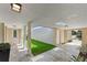 Bright and airy entryway with skylights and access to the backyard at 717 Ocean Shore Blvd, Ormond Beach, FL 32176
