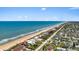 Beachfront property and coastline aerial view at 717 Ocean Shore Blvd, Ormond Beach, FL 32176