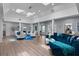 Bright living room featuring hardwood floors and comfortable seating at 717 Ocean Shore Blvd, Ormond Beach, FL 32176