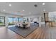 Open concept dining room with wooden table and ocean view at 717 Ocean Shore Blvd, Ormond Beach, FL 32176